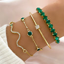 Kit com 4 pulseiras femininas premium estilo cobra, acabamento metálico com pedras brilhantes, acessório elegante para festas, eventos e uso diário.